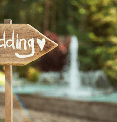 Sign pointing to a wedding