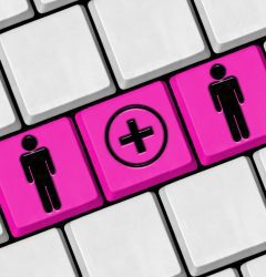 Bride and groom buttons on a keyboard with online wedding RSVP